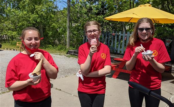 Students eating ice cream after performing for Memorial Day 